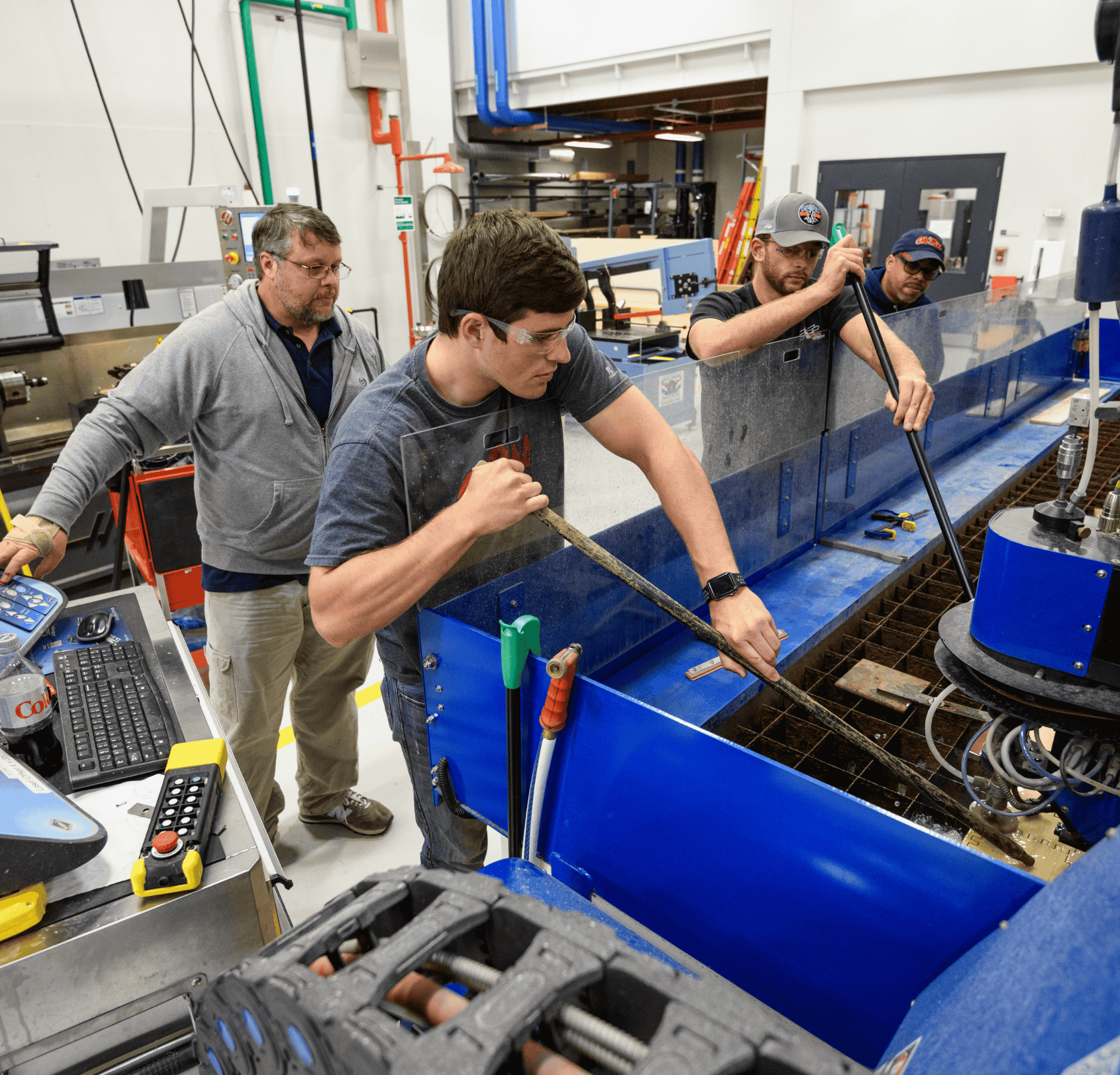 Researchers working on equipment