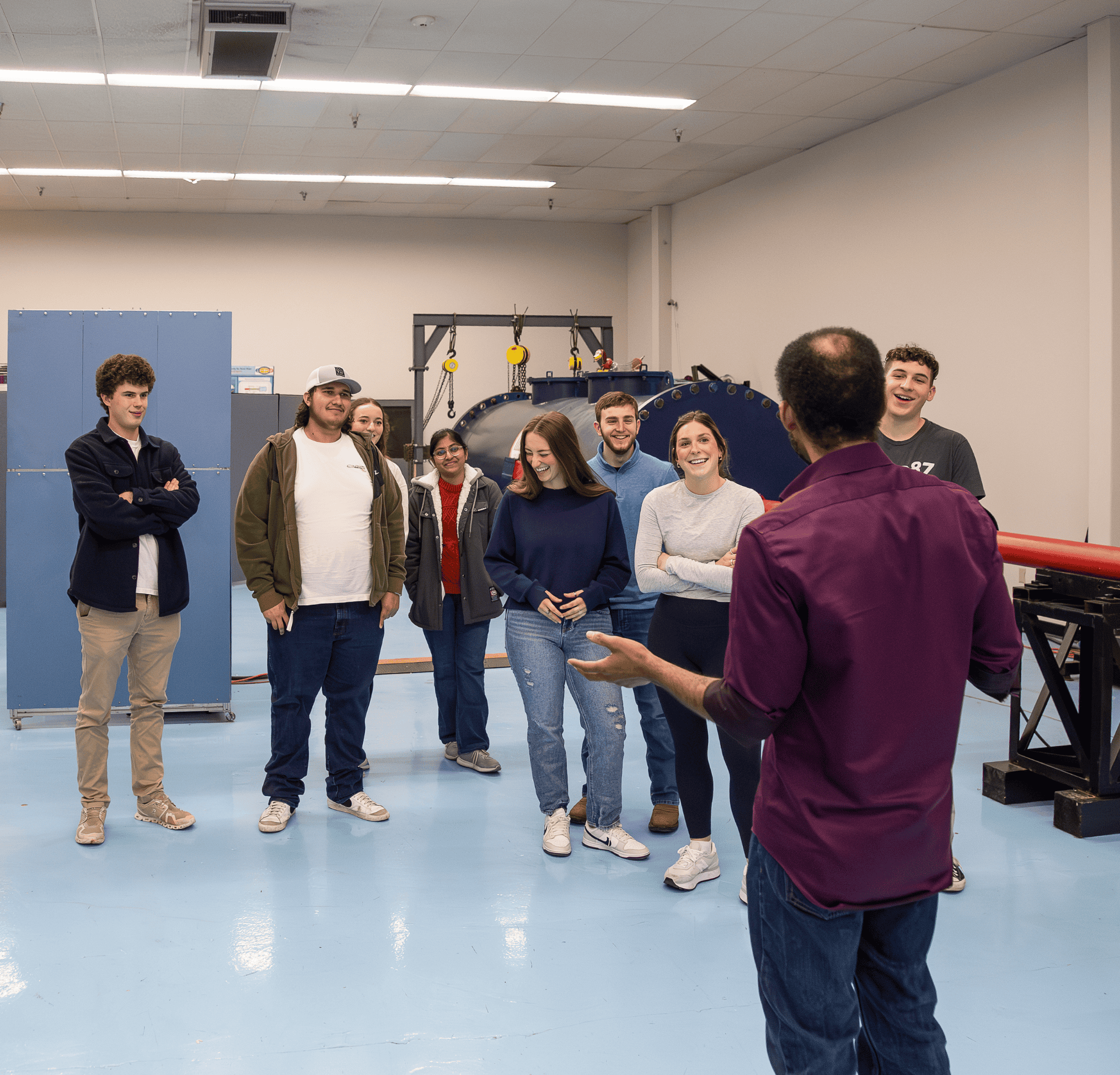 Group of students listening to a professor