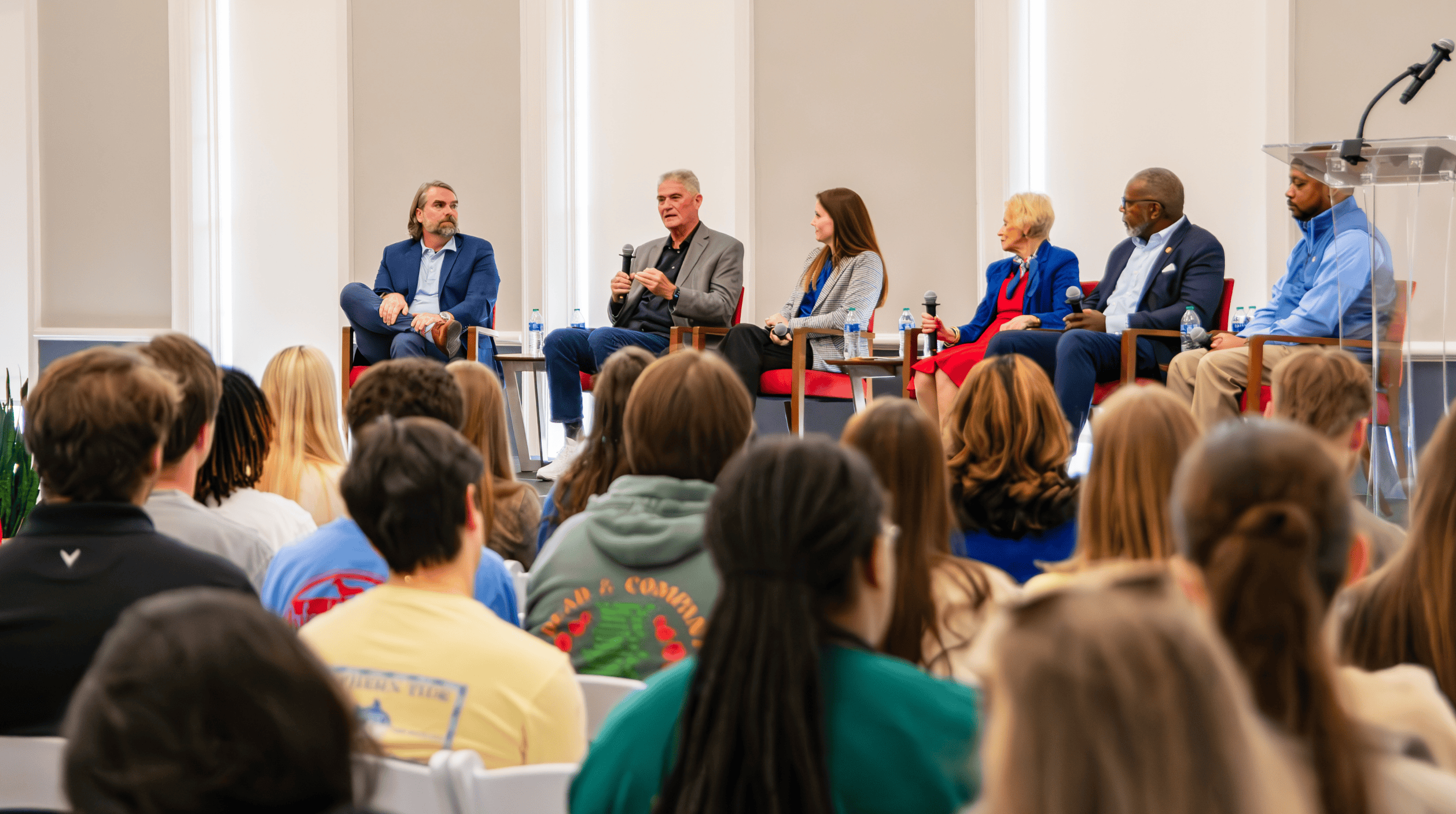 Panel speaking on stage