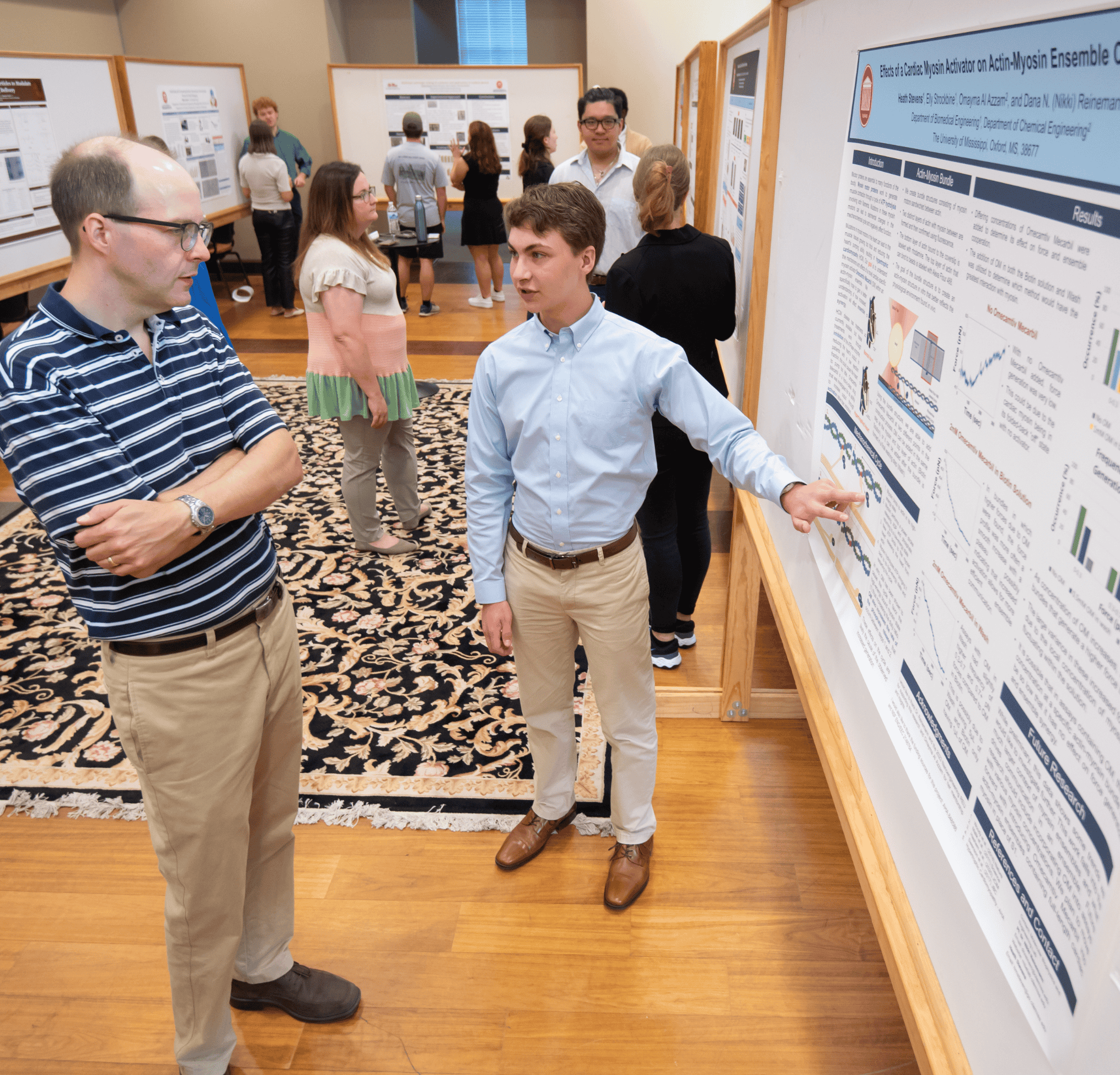 Two researchers discussing