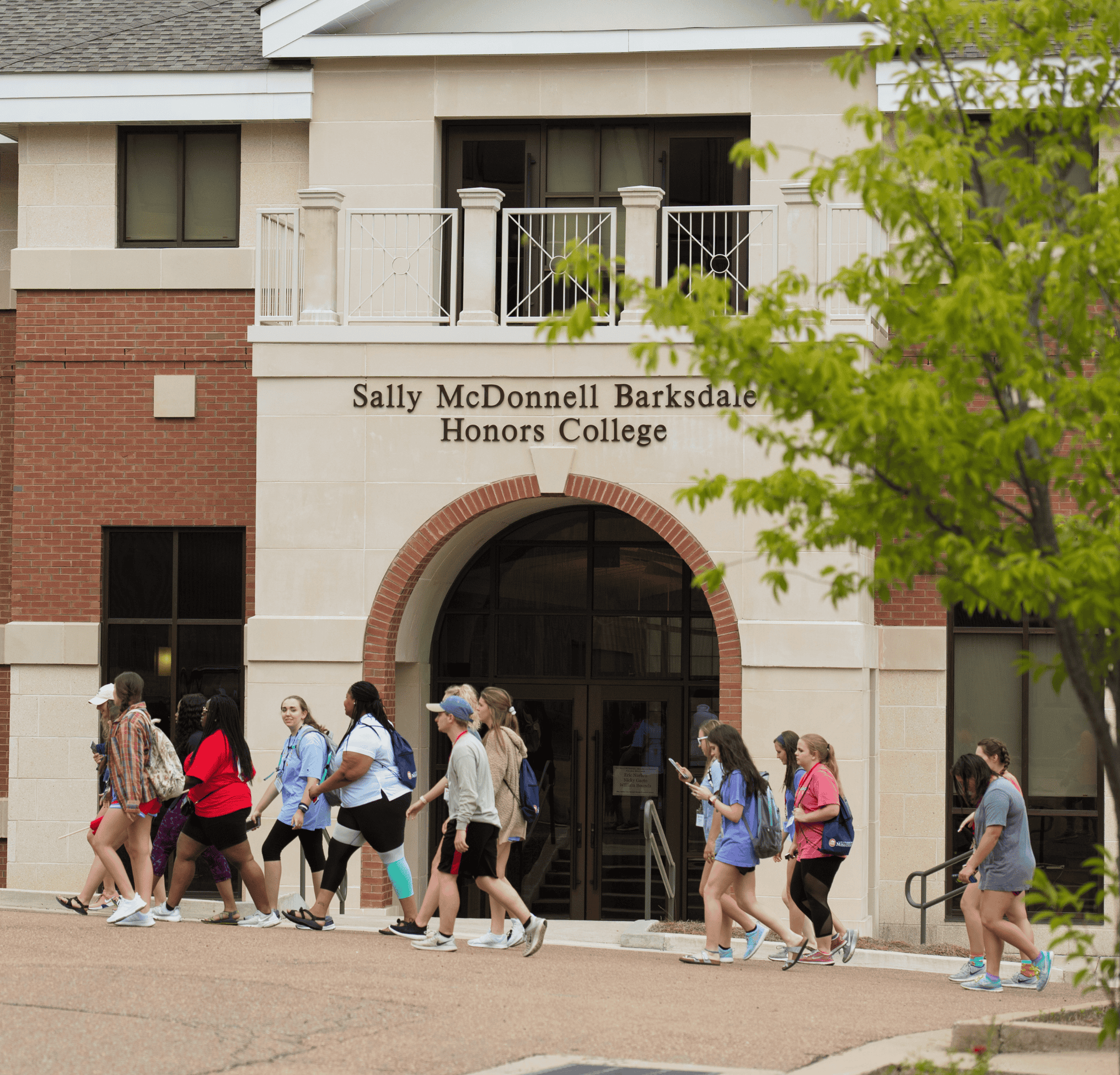 Students walking in front of Honors College
