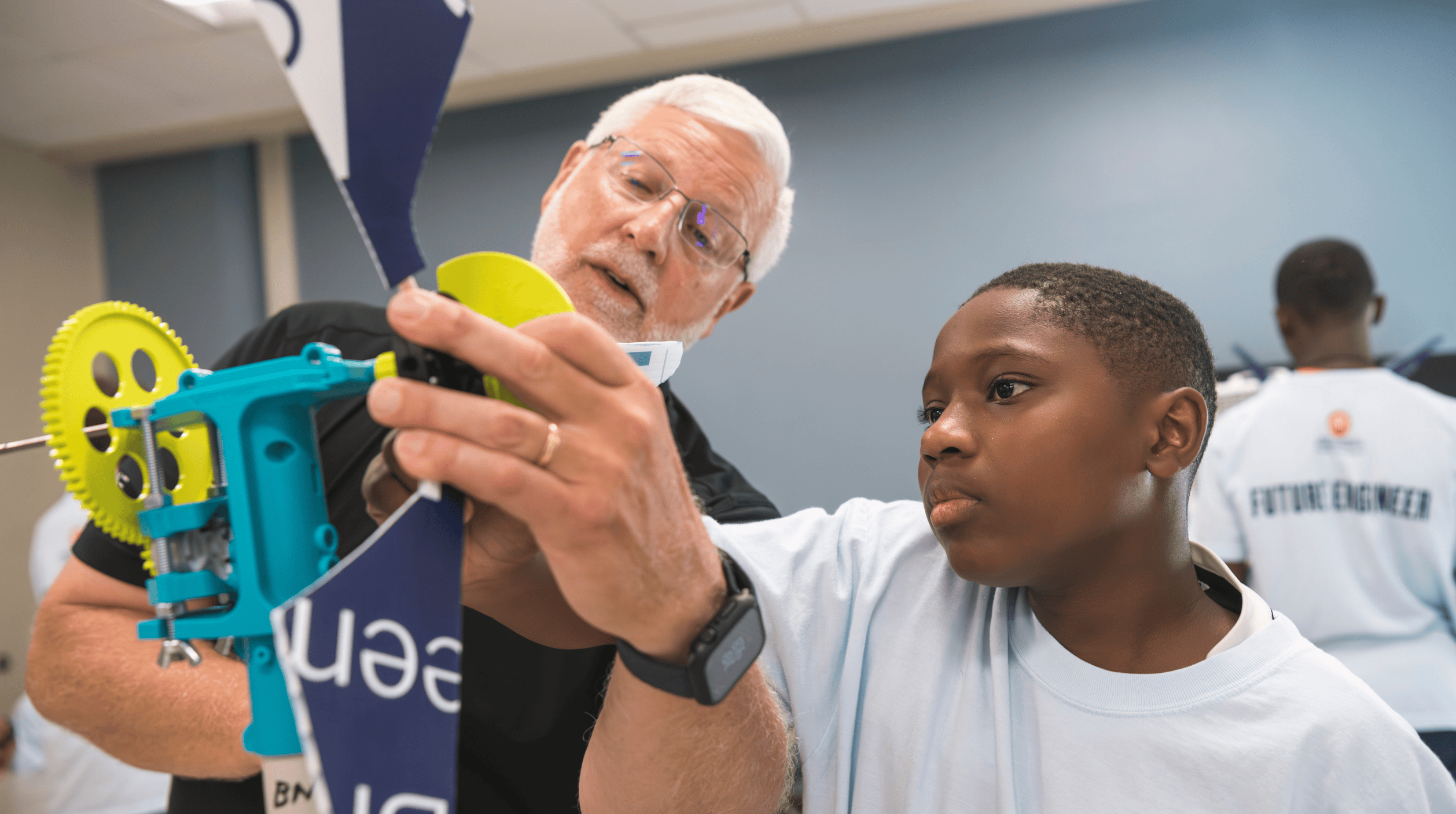 Professor with younger student
