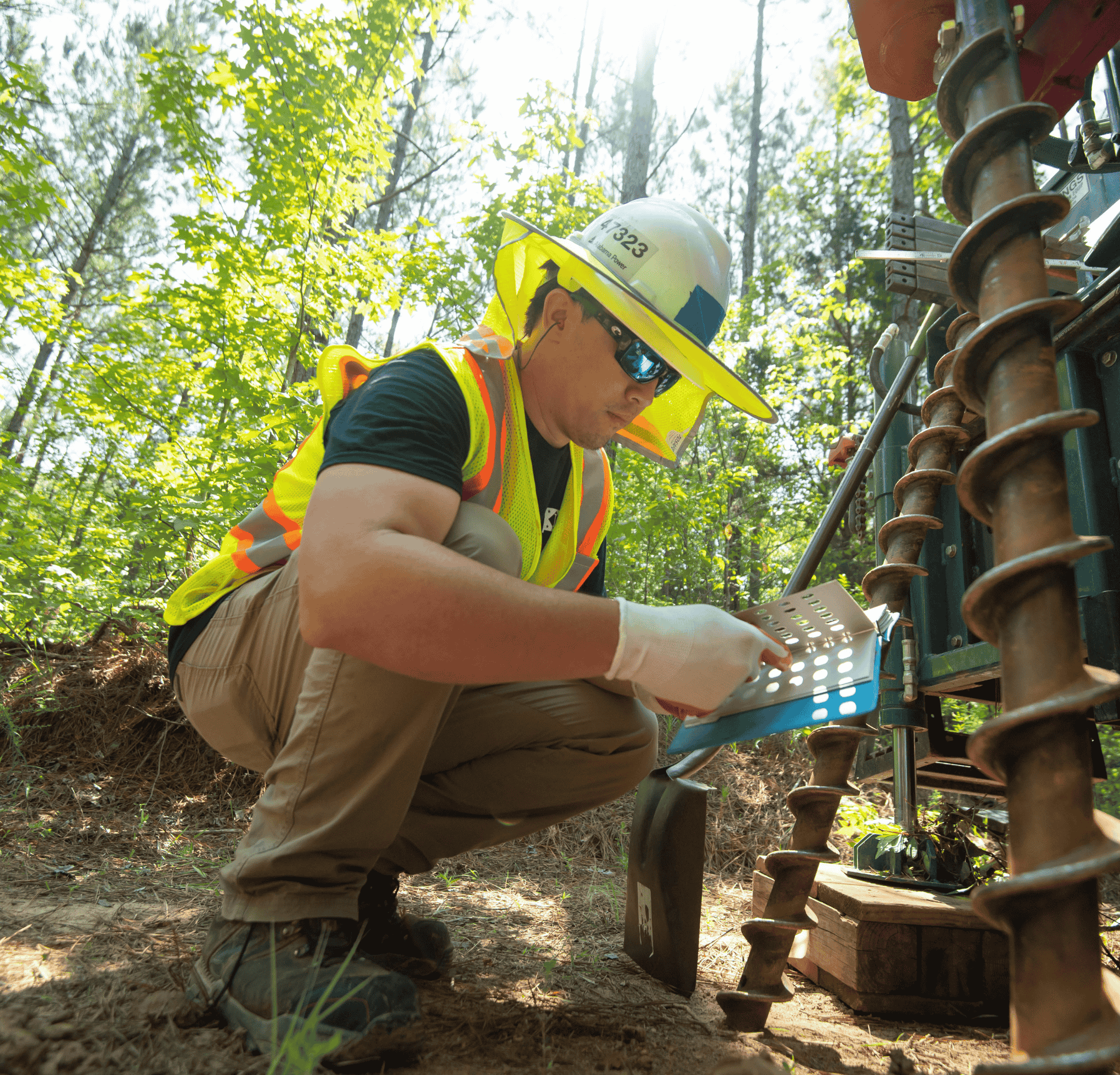 Researcher working in field on project