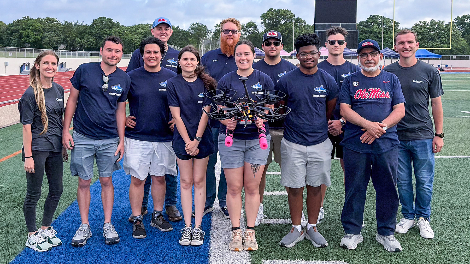 The Ole Miss senior design team, the Drone Sharks, and advisors pose with their second-place winning UAV.